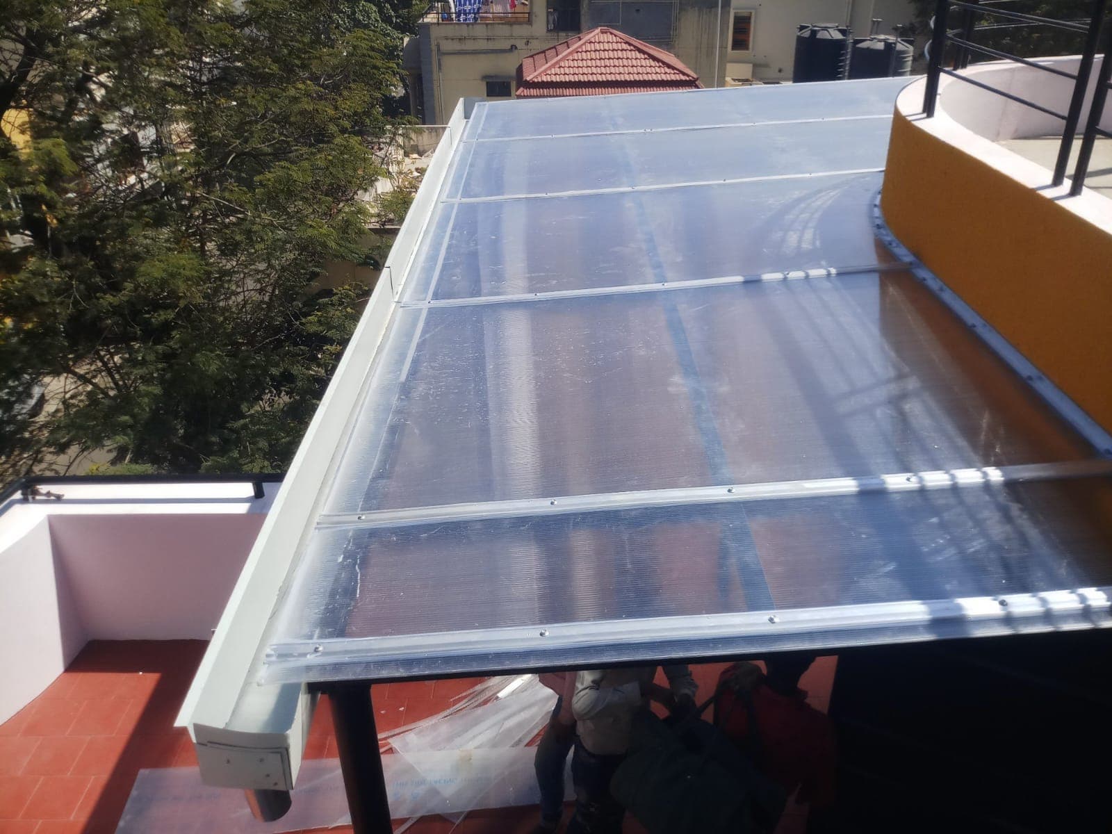 Large glass and aluminium window installation on a building facade